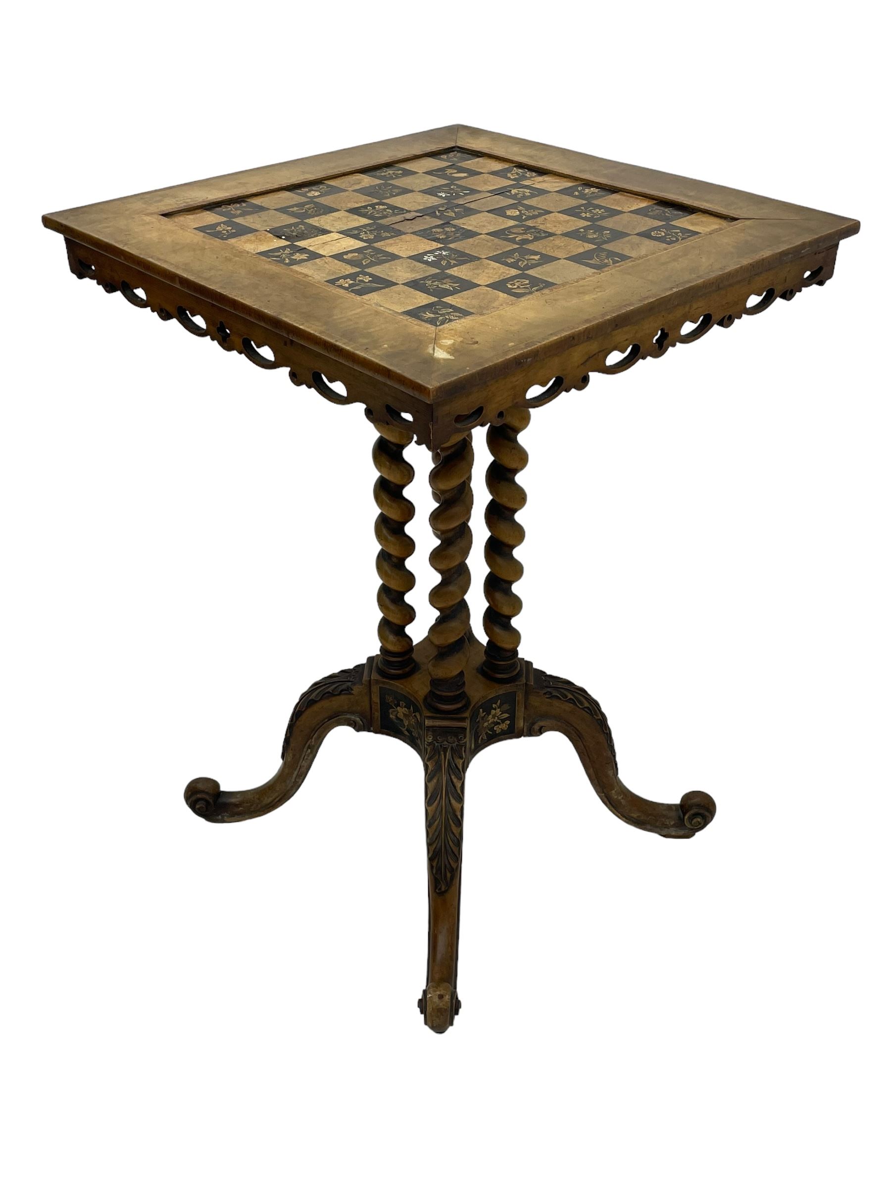 Late 19th century walnut games table, the square top with sunken inlaid chessboard decorated with inlaid floral bouquets, shaped and pierced frieze rails, on quadruple spiral turned pillars, concaved square platform inlaid with flowers, on acanthus leaf carved splayed supports with scrolled terminals 