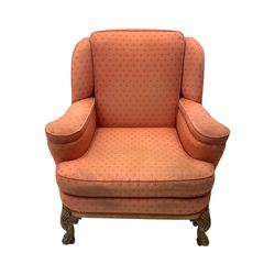 Late 20th century mahogany framed three seat sofa, upholstered in cream fabric with repeating cross pattern, raised on cabriole supports (W192cm, D98cm, H89cm); matching armchair in light pink fabric (W92cm, D98cm, H89cm) 