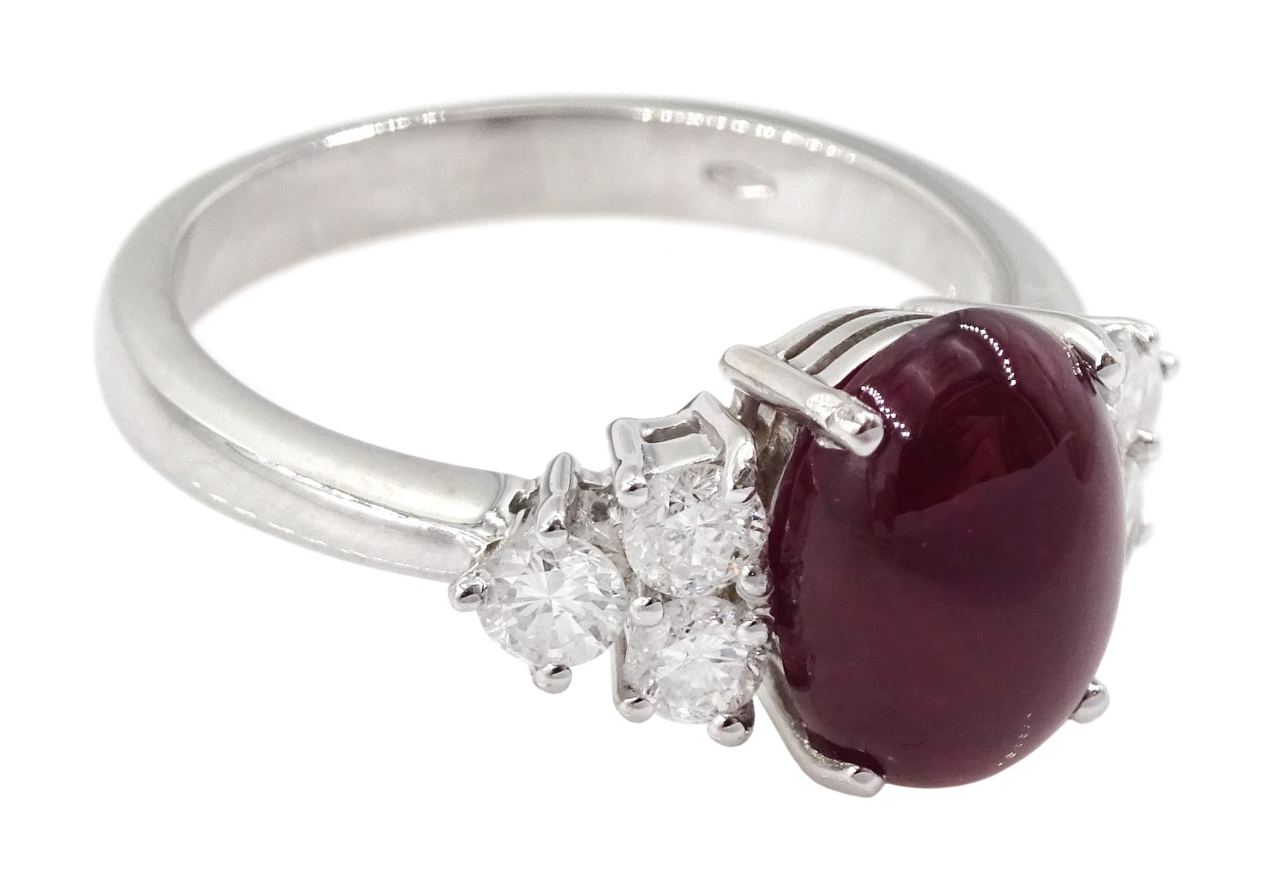 18ct white gold cabochon cut ruby and six stone round brilliant cut diamond ring, hallmarked, ruby approx 3.70 carat, total diamond weight approx 0.55 carat