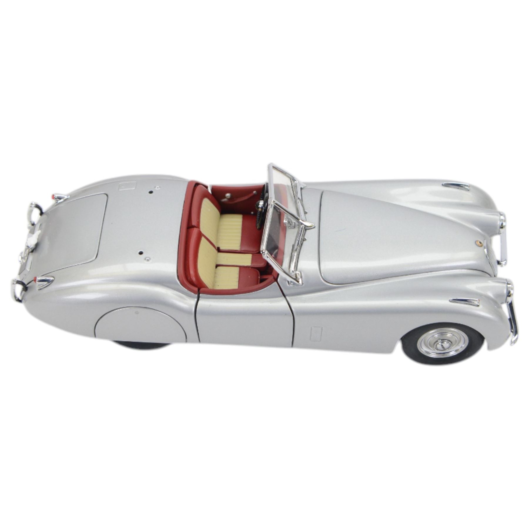 Five Franklin Mint 1:24 scale diecast models, comprising 1961 Jaguar E-Type, Jaguar XK 120,Jaguar SS-100, 1948 MG-TC and a 1904 Mercedes Simplex, all in original packaging four with paperwork