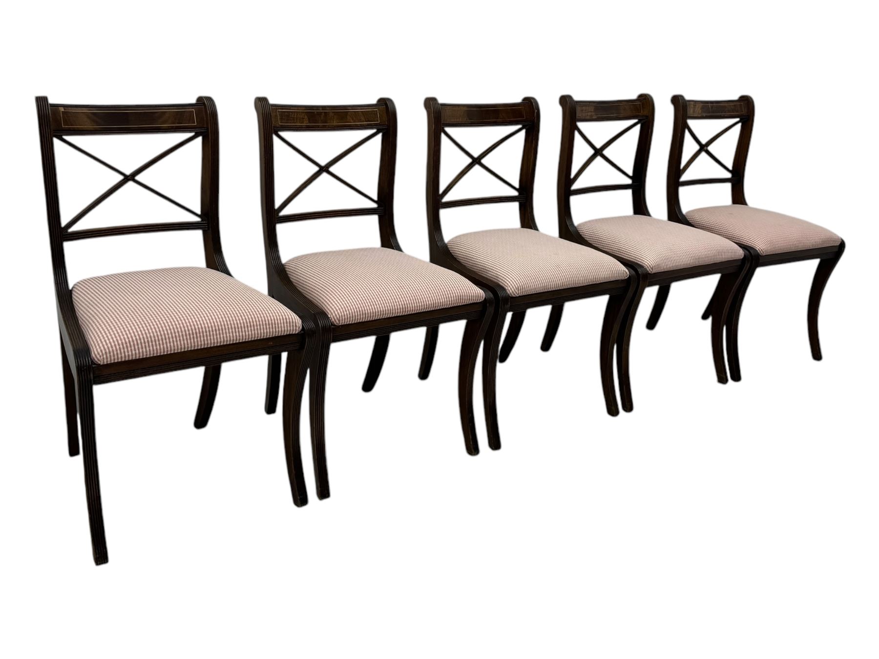 Set of ten (8+2) Regency design mahogany and brass inlaid dining chairs, bar cresting rail over x-framed back, upholstered drop-in seats, moulded frame and sabre supports 