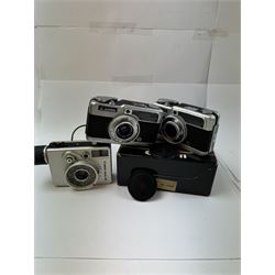 Three Canon half frame cameras, comprising two Canon Demi examples, serial nos. 243090 & 704714, one example boxed, and a Canon Dial35 serial no. 341572