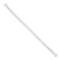 18ct white gold three row round brilliant cut diamond bracelet, stamped, total diamond wei...