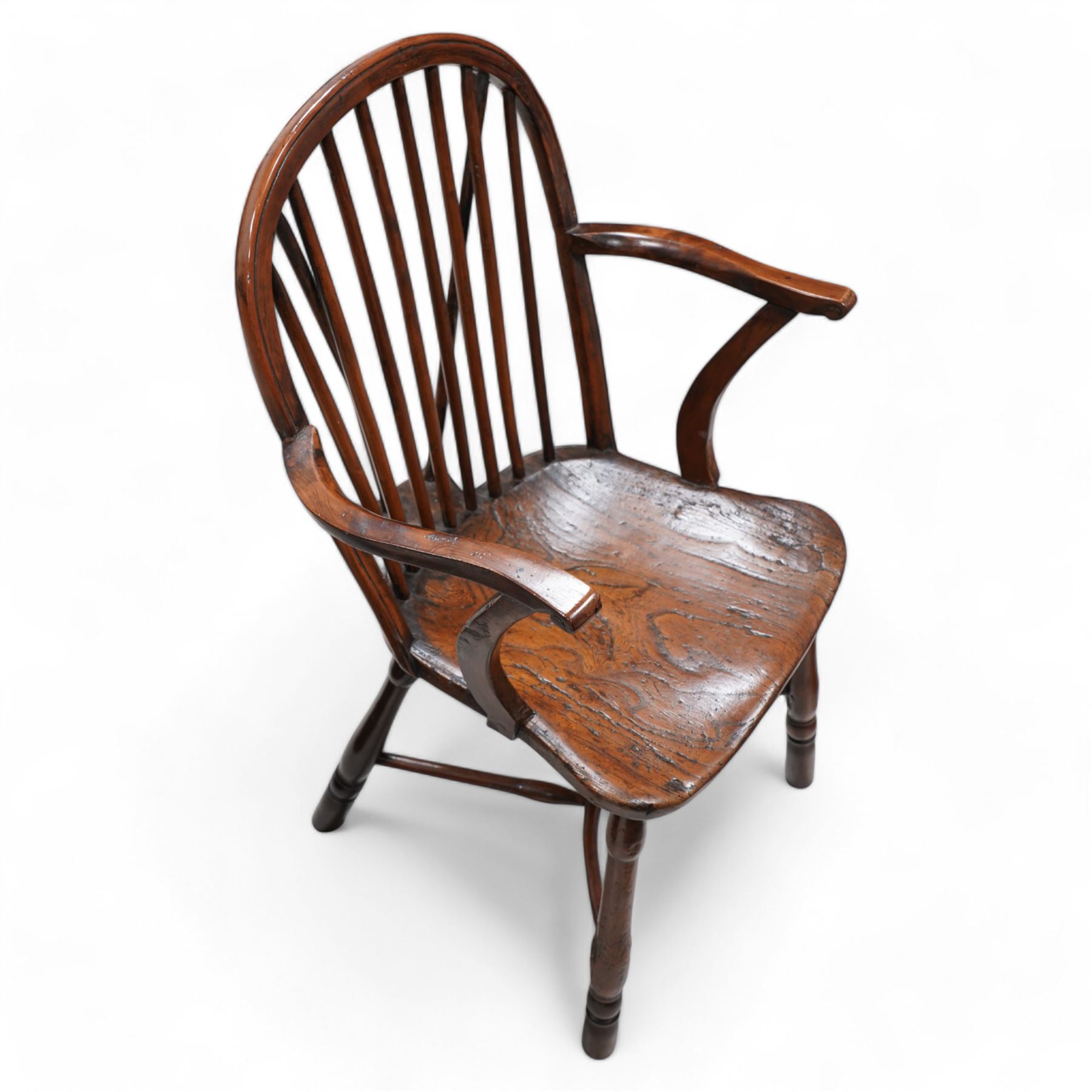 19th century yew wood and elm Thames Valley Windsor armchair, hoop and stick back over shaped arms, dished elm seat on turned supports united by crinoline stretcher 