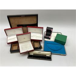 Collection of jewellery boxes including a vintage Boodle & Dunthorne bracelet box, two modern Boodles boxes, two Cartier Santos 701 sunglasses cases, one other Cartier box, Harrods cufflink/ring box and a Penlington & Batty necklace box (8)