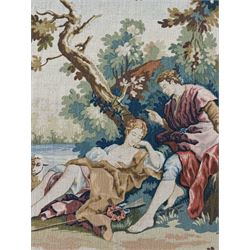 Large French machine woven tapestry, depicting figures in a landscape with a floral boarder 