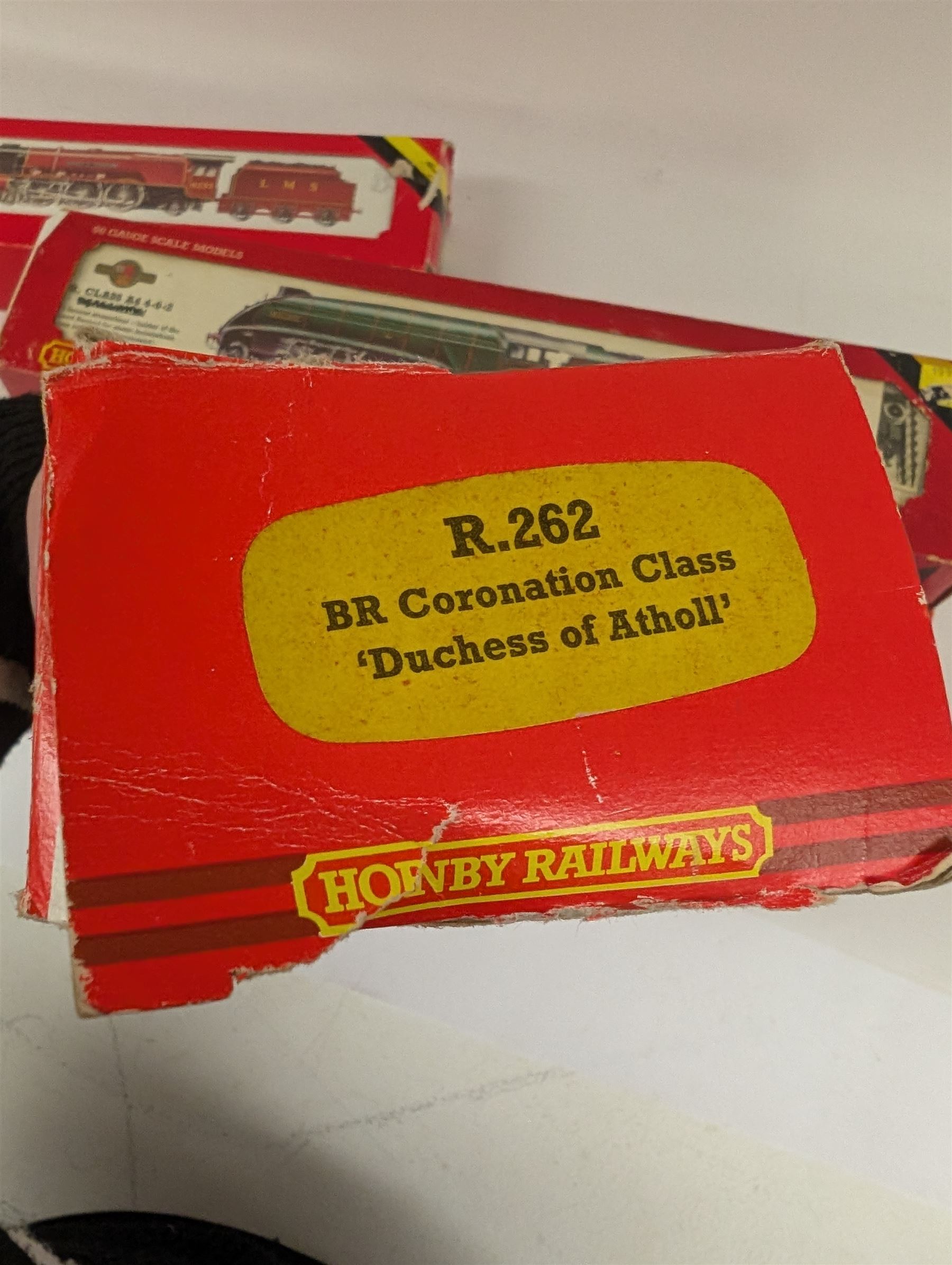 Four Hornby '00' gauge locomotives, comprising R859 BR Black Five Class 4-6-0 locomotive no. 45076, R262 BR Coronation Class 4-6-2 locomotive reworked as no. 46230 Duchess of Buccleuch, R066 Coronation Class 7P 4-6-2 reworked as BR City of Nottingham no. 46251 and R350 BR Class A4 4-6-2 locomotive reworked as Kingfisher no. 60024, all boxed 