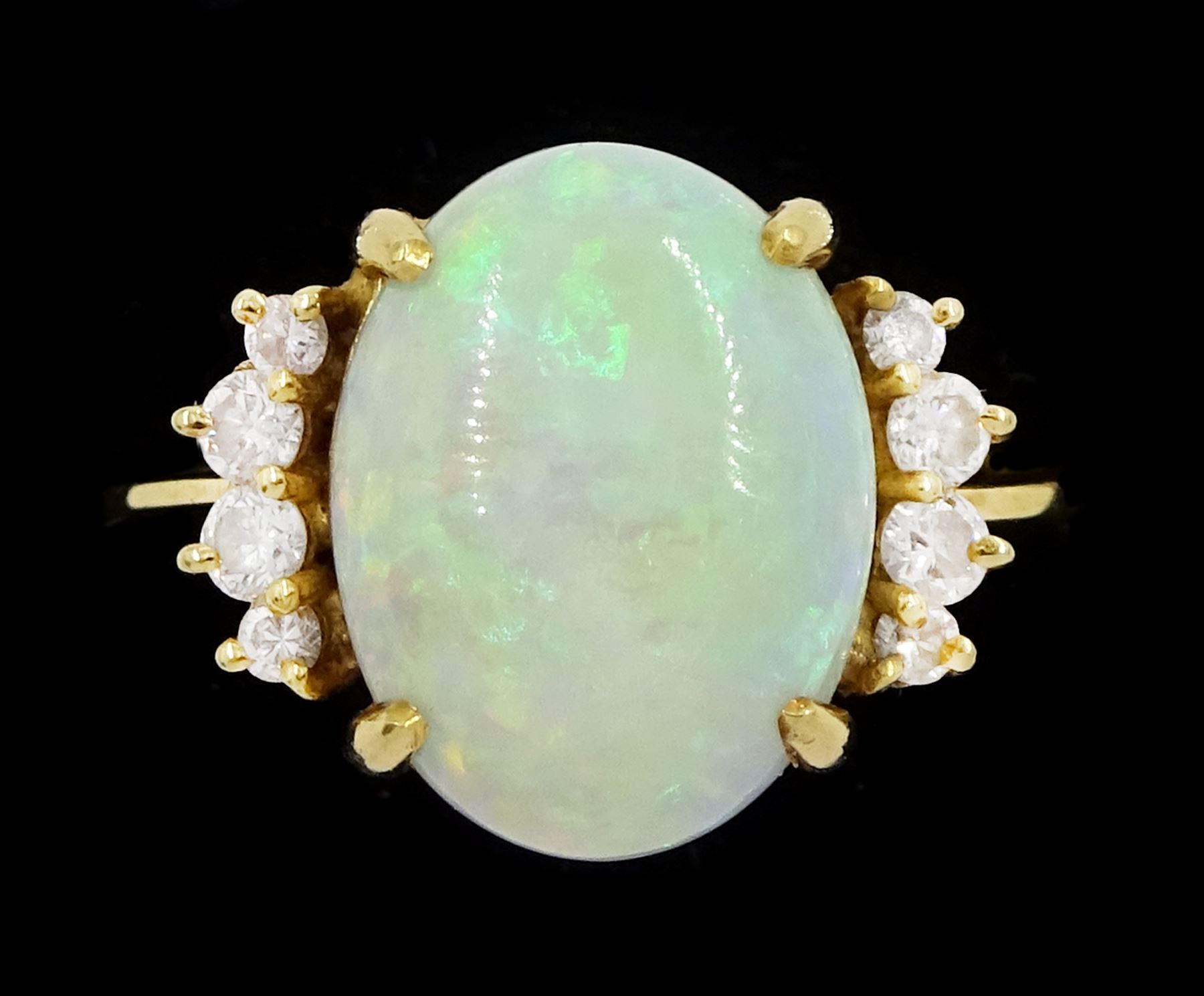 18ct gold single stone opal ring, with four round brilliant cut diamonds set either side, old opal ring, with four diamonds set either side