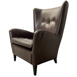 Wing back armchair upholstered in cocoa brown leather