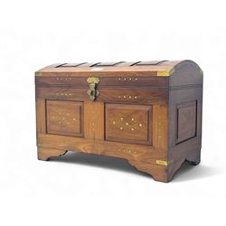 Mid-to-late 20th century Eastern brass inlaid hardwood trunk, the hinged domed top enclosi...