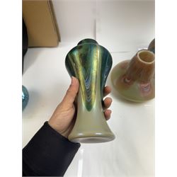 Three Austrian Art Nouveau iridescent glass vases by Rindskopf, all of varying form, each with pulled feather decoration to body, tallest H20.5cm