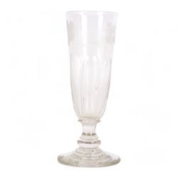 Early 19th century drinking glass, the part fluted funnel bowl engraved with leaves, upon a short knopped stem, and flat foot, H18cm