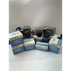 Four Minolta Vectis cameras bodies, to include two Vectis S-1 examples, serial nos. 96622420 & 02629088 and two Vectis S-100 examples, serial nos. 98713950 & 98704095, together with a collection of Minolta Vectis accessories and lenses, including boxed examples