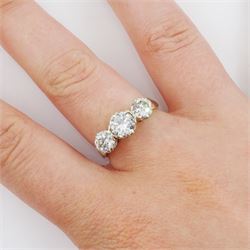 18ct gold three stone round brilliant cut diamond ring, stamped, total diamond weight approx 1.75 carat