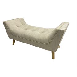 Contemporary U-shaped window or bed stool, upholstered in buttoned neutral fabric