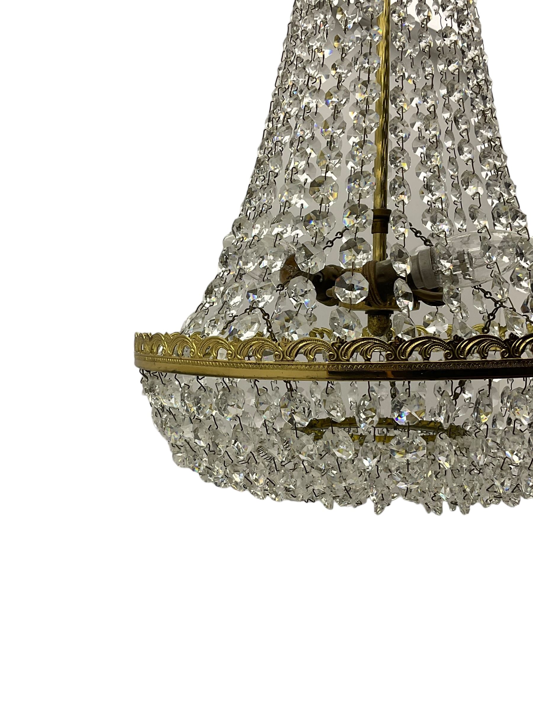 Gilt metal chandelier, circular form with glass bead pendants, three branches 