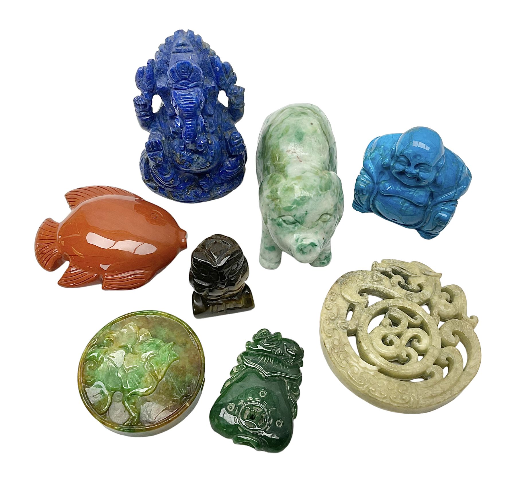 Carved Lapis lazuli figure in the form of Ganesha, together with turquoise carved buddha, tigers eye owl and other carved figures and plaques, Ganesha 8cm