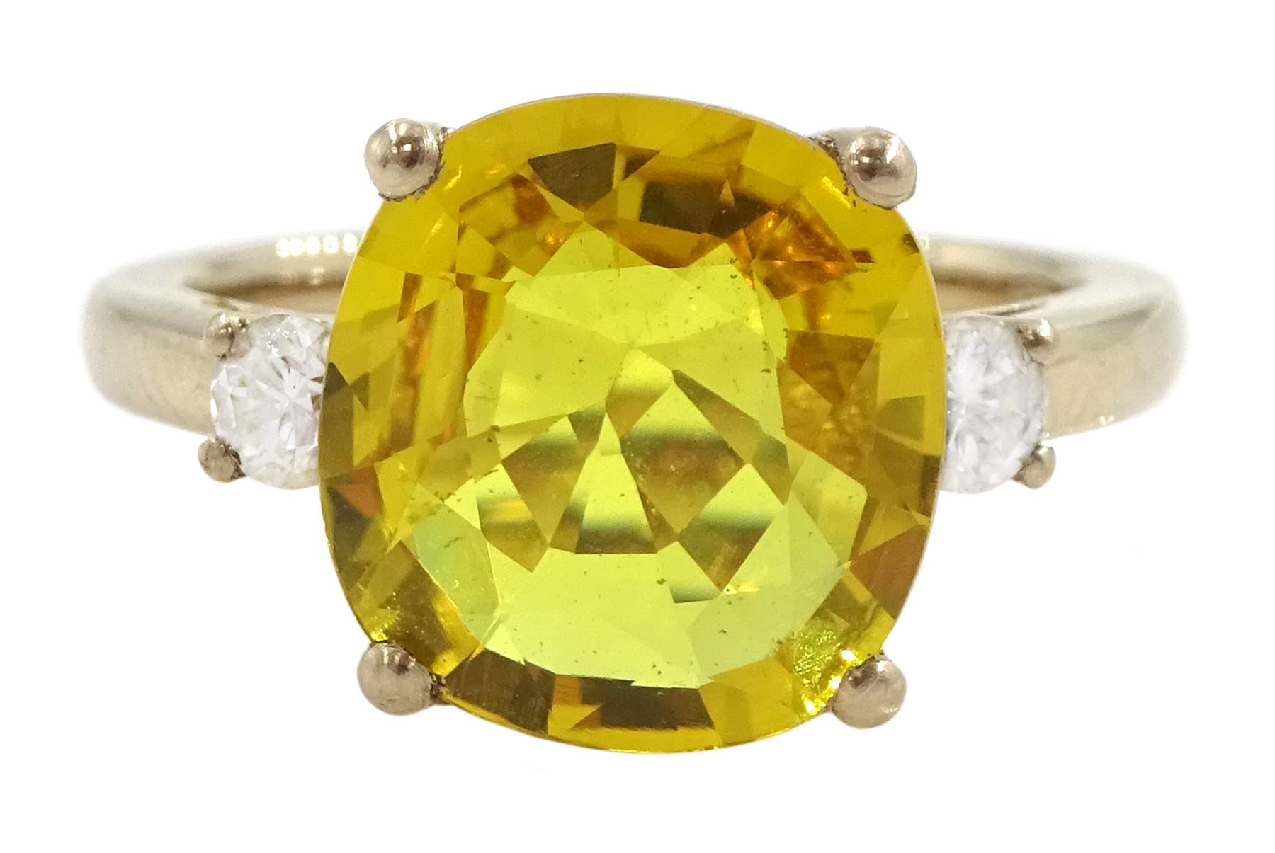 18ct gold three stone yellow sapphire and round brilliant cut diamond ring, hallmarked, yellow sapphire approx 5.20 carat