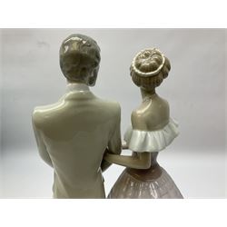 Lladro figure, An Evening Out, modelled as a man and women in evening dress, with original box, no 5540, sculpted by Francisco Catala, year issued 1988, year retired 1991, H32cm 