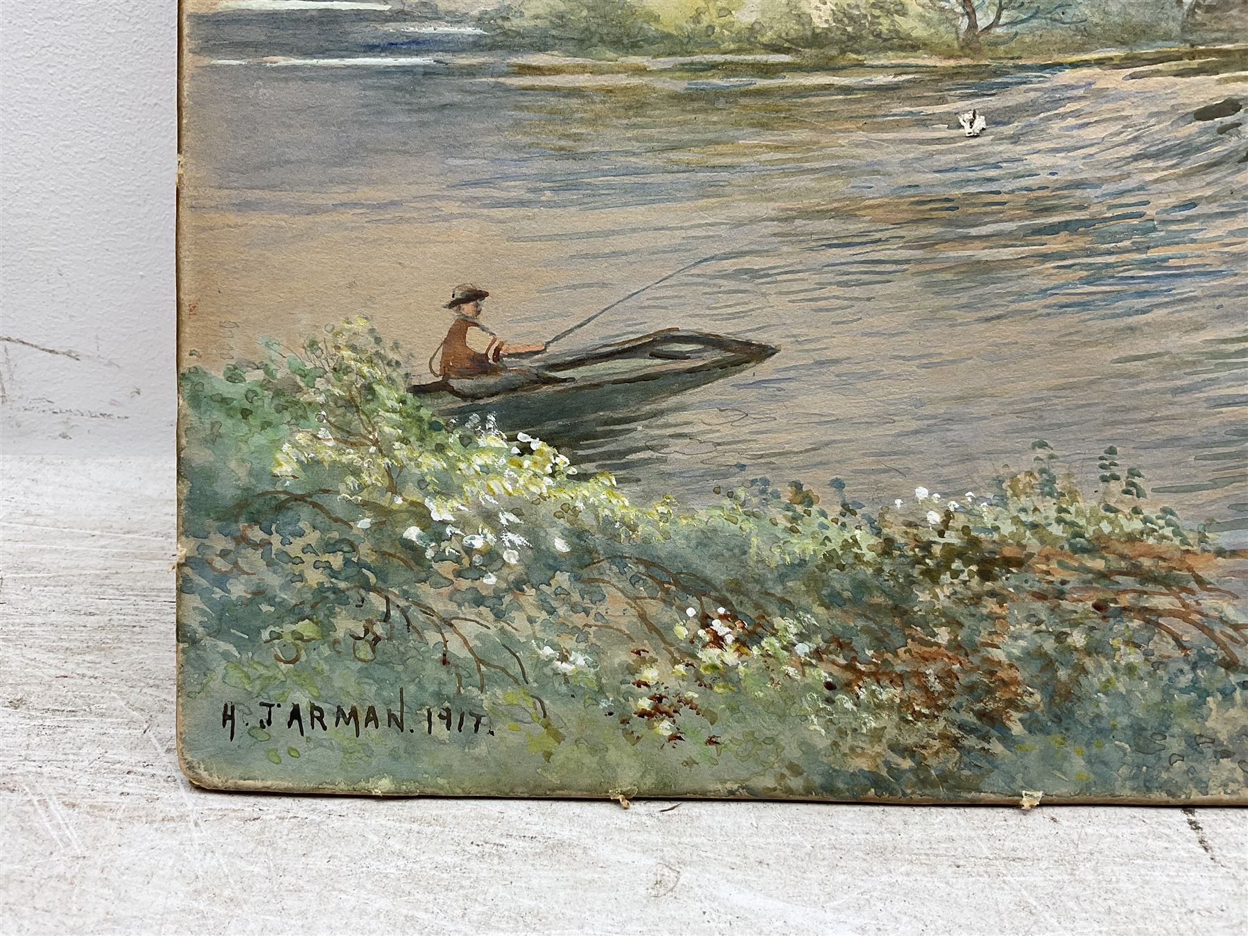 Peter A Hurst (British 20th Century): 'Thames at Twickenham', watercolour signed, titled on mount; H Jarman (British 19th Century): Fishing From the Bridge, watercolour signed and dated 1917, indistinctly inscribed verso max 35cm x 50cm (2) (one unframed)