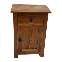 Pair of hardwood bedside cabinets, fitted with single drawer over panelled cupboard 