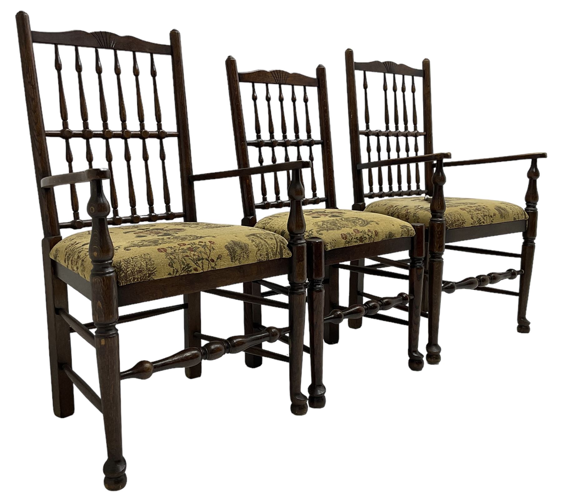 Set of six (4+2) 20th century oak spindle back dining chairs, with upholstered drop-on seat cushions, turned supports joined by turned stretchers