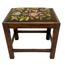 19th century country elm stool, rectangular form with drop-in seat upholstered in floral needlework, moulded frame and supports, united by plain stretchers 