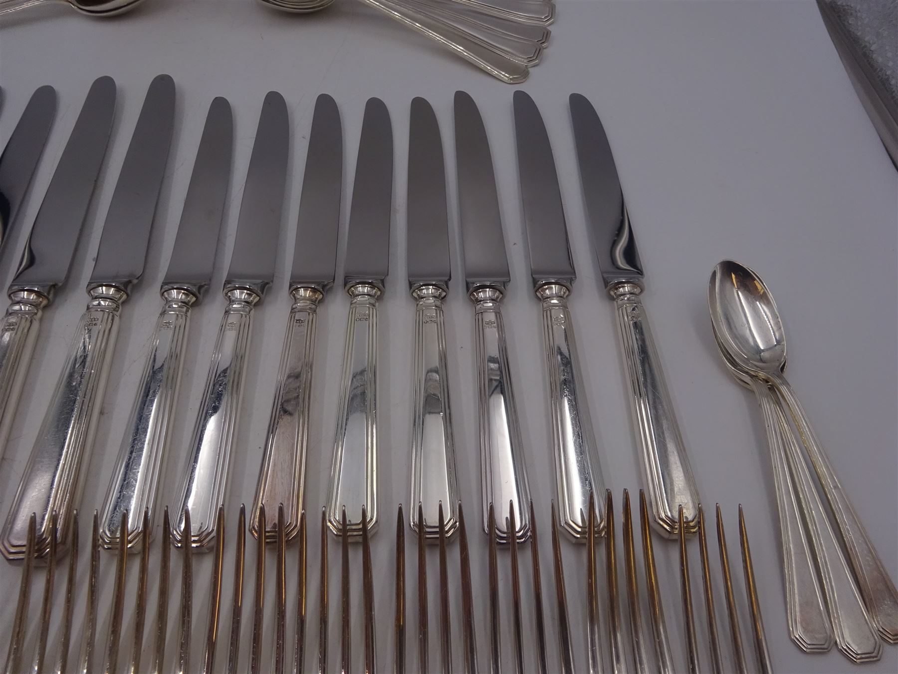 Mappin & Webb Athenian pattern silver cutlery for eight place settings, comprising table forks, silver handled table knives, dessert spoons, dessert forks, silver handled butter knives, soup spoons and teaspoons, hallmarked Mappin & Webb Ltd, Sheffield 1978, contained within anti-tarnish fabric wraps and boxed 