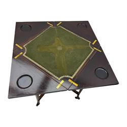 Victorian rosewood envelope games table, the moulded square top with four triangular hinged leaves, revealing inset baize playing surface and sunken counter wells, fitted with single frieze drawer, on square tapering supports united by x-framed stretchers and turned central column, on brass and ceramic castors 