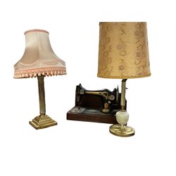 Cased Singer sewing machine, with two table lamps including a brass corinthian column example