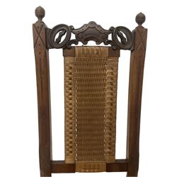 Victorian Aesthetic Movement mahogany framed folding campaign chair, pierced and carved cresting rail with carved and chamfered uprights, rattan back and seat