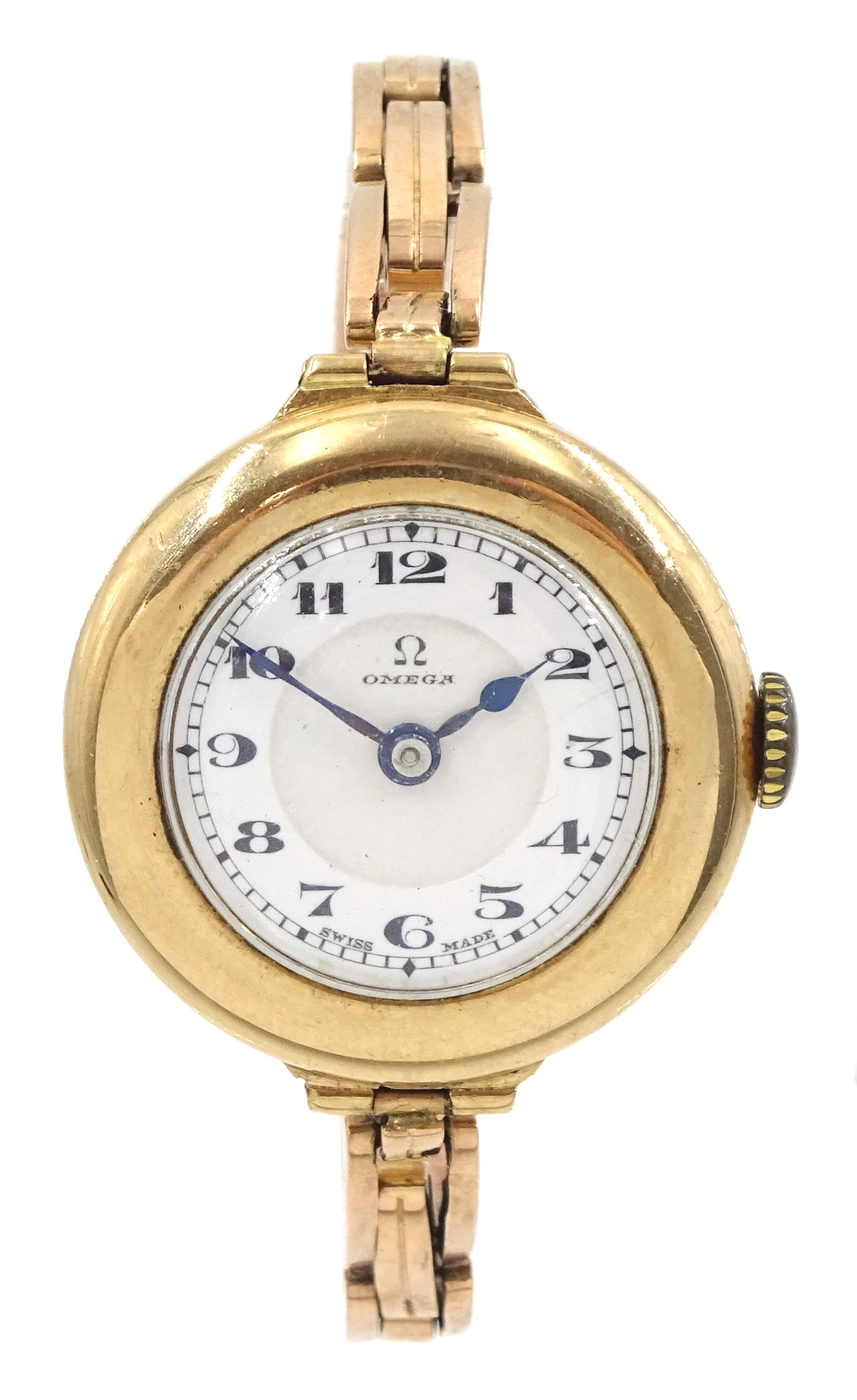 Omega early 20th century 9ct gold manual wind wristwatch, No. 6877301, white enamel dial with Arabic numerals, Birmingham 1927, on expanding gold strap, stamped 9ct