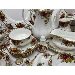 Royal Albert Old Country Roses pattern coffee service for six, comprising coffee pot, milk jug, cups and saucers, cake plate, together with miniature teapot, six teacups and saucers, six dinner plates, six side plates etc 