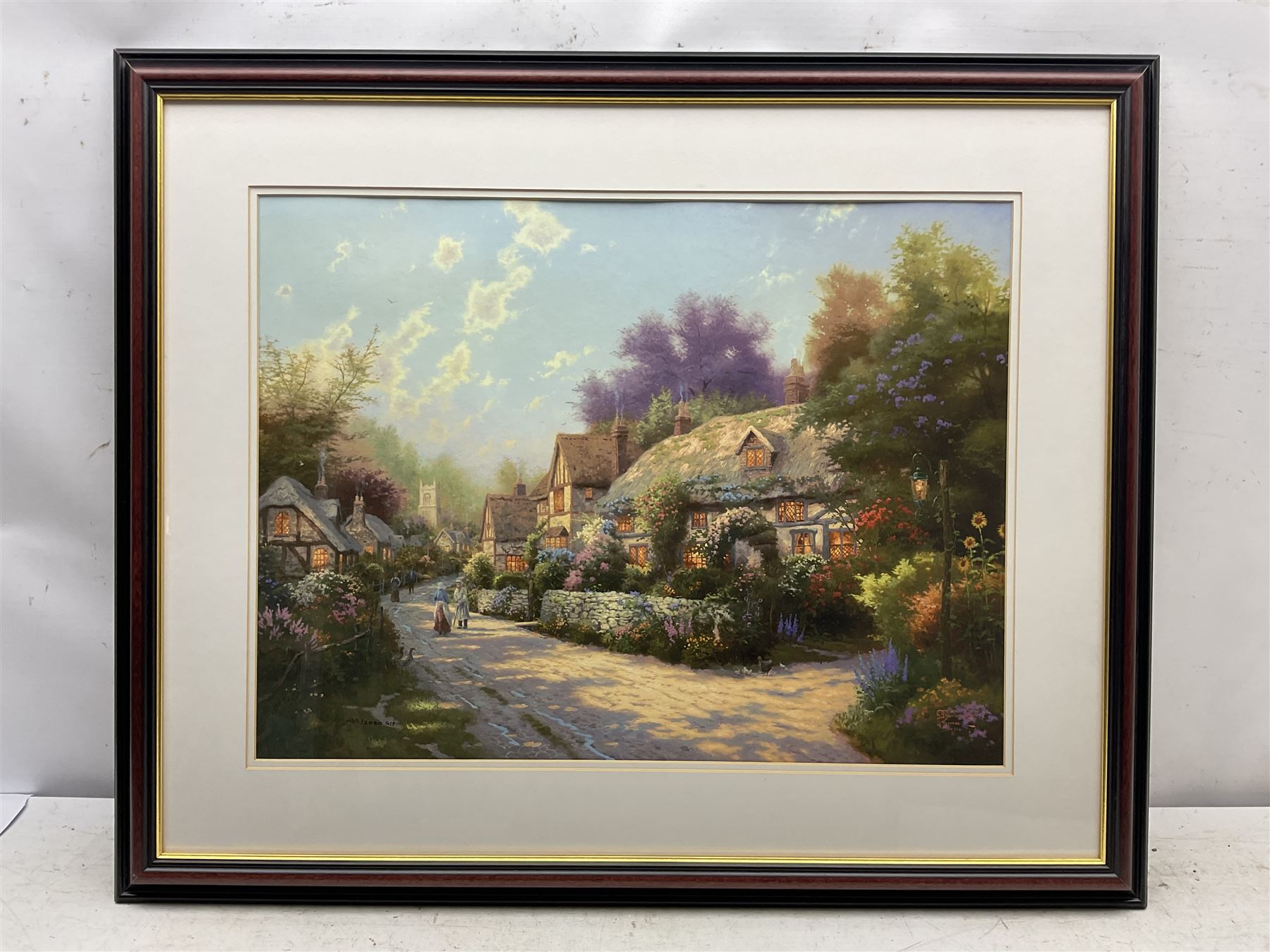 Thomas Kinkade (American 1958-2012): 'Cobblestone Village' and 'Evening Glow', two offset lithographs no.1435/2050 and no.43/1000, respectively, with Certificate of Authenticity 45cm x 60cm and 40cm x 50cm (2)