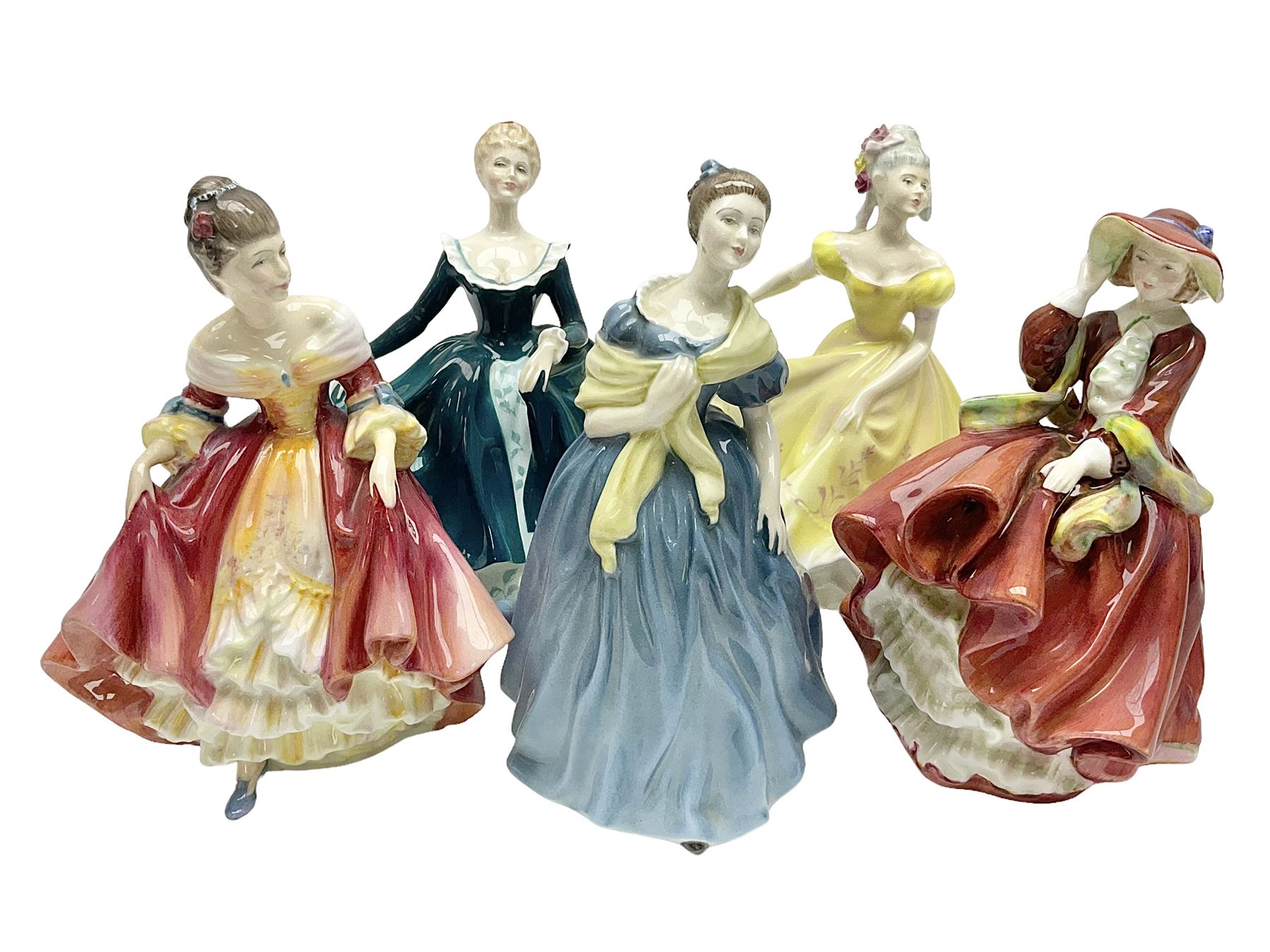 Five Royal Doulton figures, comprising Ninette HN2379, Adrienne HN2304, Top o the Hill HN1934, Janine HN2461, Southern Belle HN2229