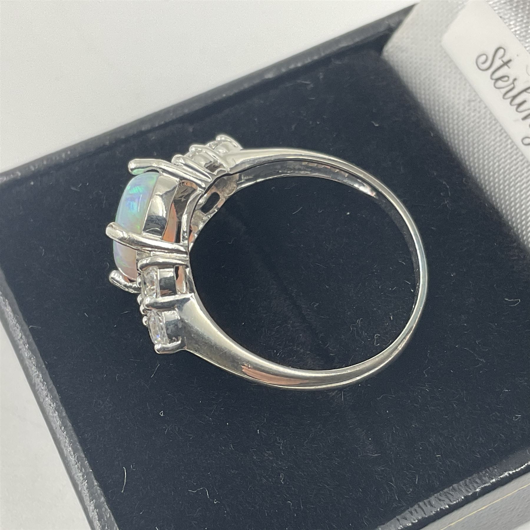 Silver opal and cubic zirconia cluster ring, stamped 925, boxed 