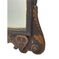 18th century black lacquered and gilt wall mirror, broken arch pediment with central cartouche decorated with curled leaves and foliate motifs, scrolled acanthus leaf eared brackets, bevelled mirror plate within gilt slip and moulded outer frame, lower shell motif surrounded by curled acanthus leaves and shield motifs 