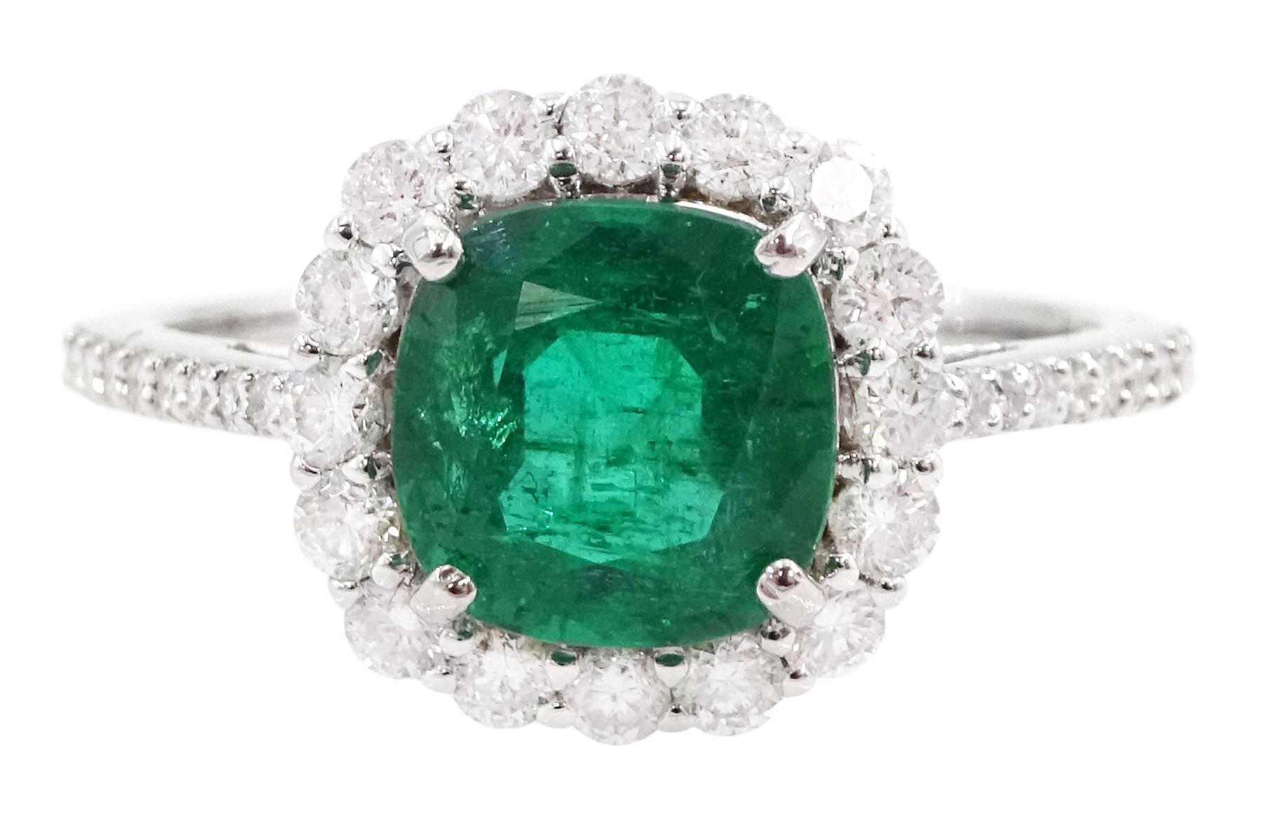 18ct white gold cushion cut emerald and round brilliant cut diamond cluster ring, stamped 750, emerald approx 1.85 carat, total diamond weight approx 0.55 carat