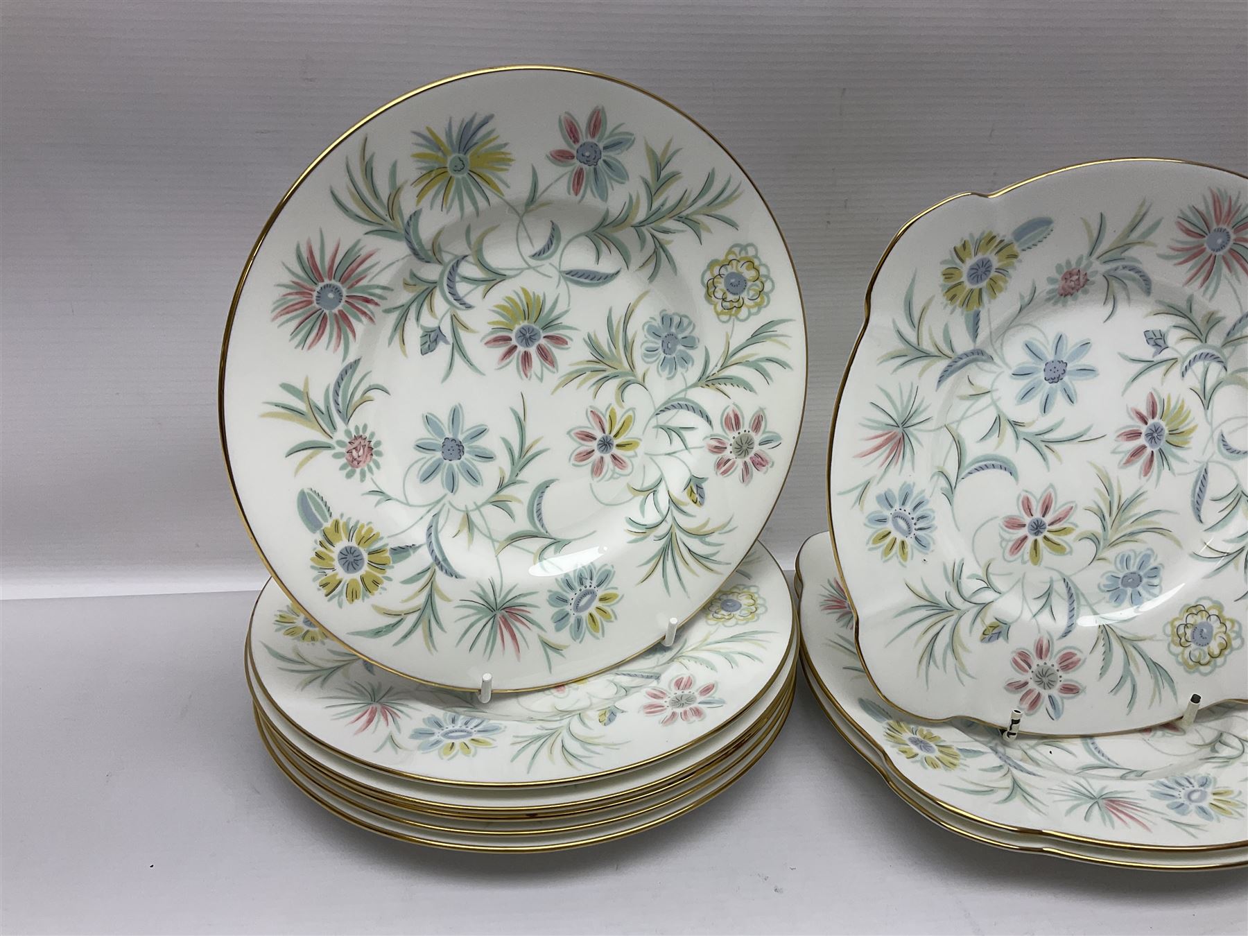 Minton Vanessa pattern part tea service, to include fifteen cups and saucers, open sucrier, milk jug, eighteen dessert plates, twelve side plates etc (70)