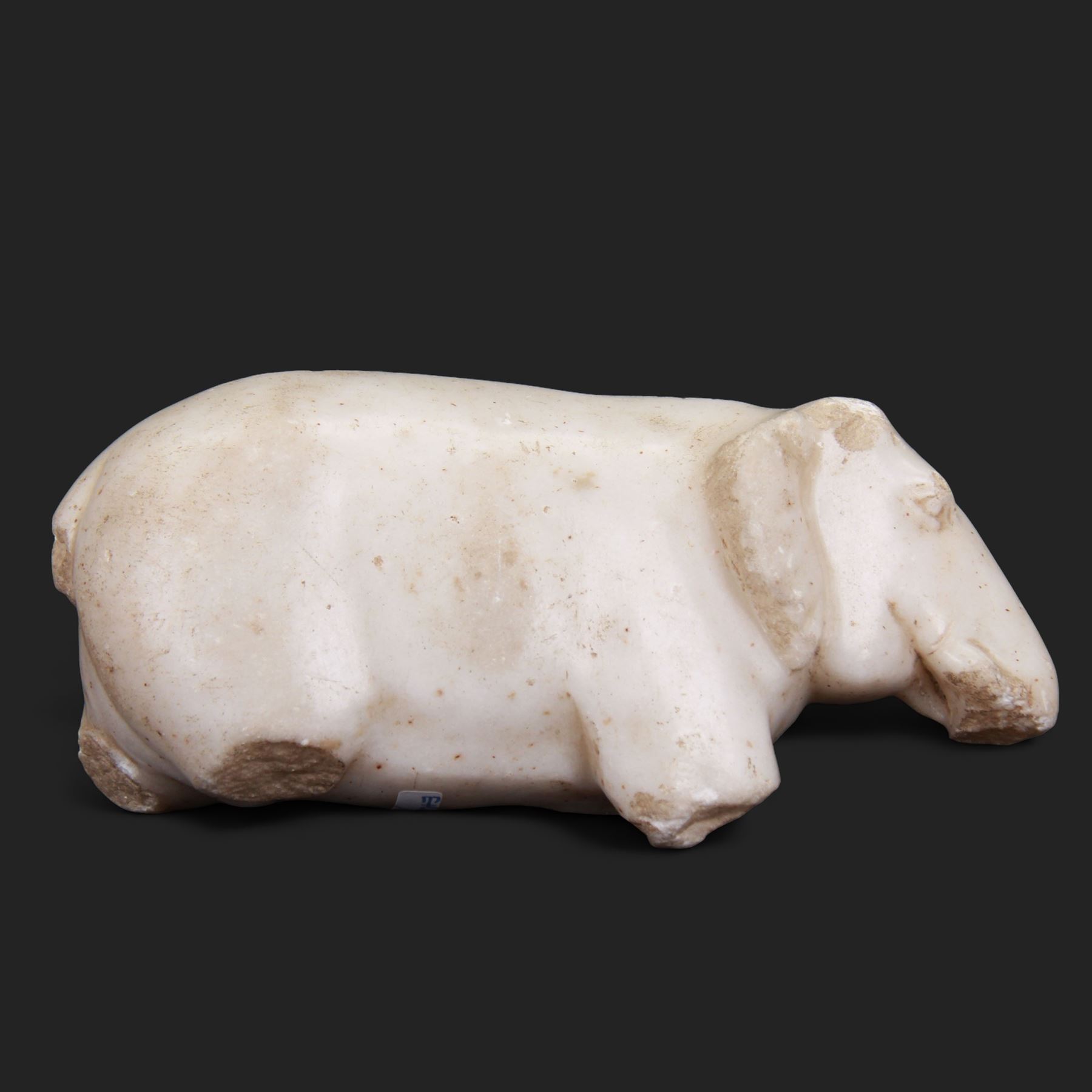 Indian marble ruinous figure, carved as an Indian elephant, H10.5cm L23cm