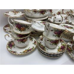 Royal Albert Old Country Roses pattern part tea and dinner service, to include two tureens, eight dinner plates, six side plates, twelve bowls, two mugs, seven teacups and saucers, milk jug,  twelve cake plates, six soup bowls and saucers, candlesticks, etc (95)