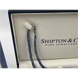 Tanzanite bead necklace with silver clasp and matching bead bracelet, together with two pairs of silver marcasite and amethyst pendant earrings, all retailed by Shipton & Co