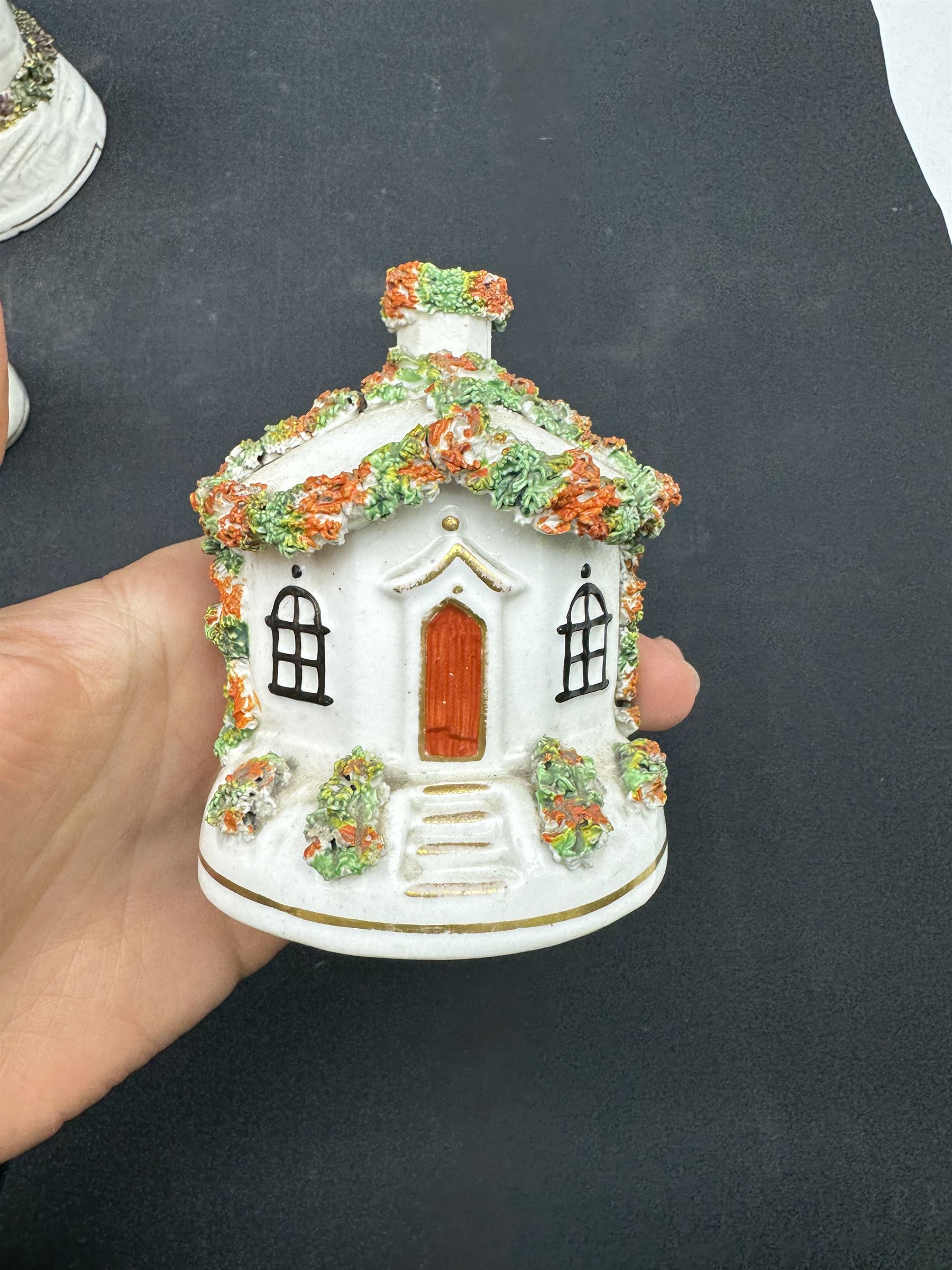 Group of five 19th century Staffordshire pastille burners, modelled as various buildings, largest example H17cm