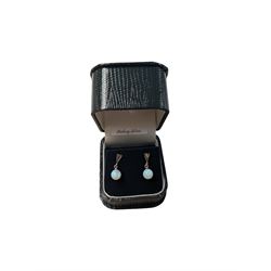 Pair of silver opal and marcasite pendant stud earrings, boxed