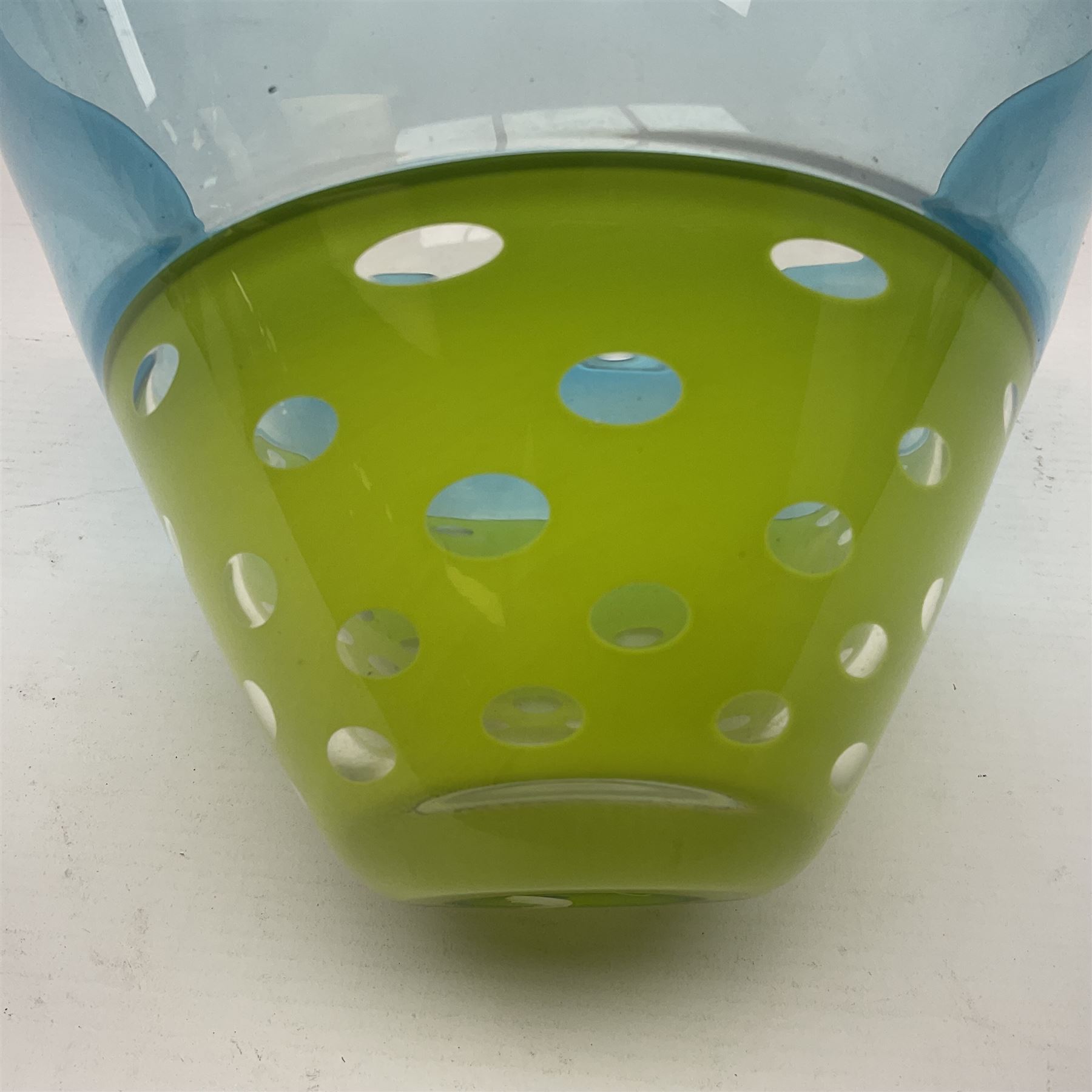 Stuart Akroyd glass vase, blue banded top and lime green opaque lower section with bubble inclusions, with sticker and engraved signature beneath, H15cm