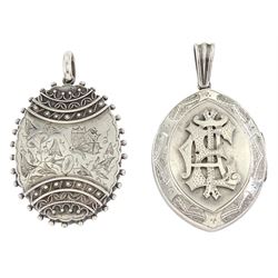 19th / early 20th century silver hinged locket, with applied wirework and engraved butterfly and foliate decoration and one other silver locket, with monogrammed decoration