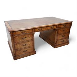 Georgian design figured oak twin pedestal desk, moulded rectangular top with brown leather...