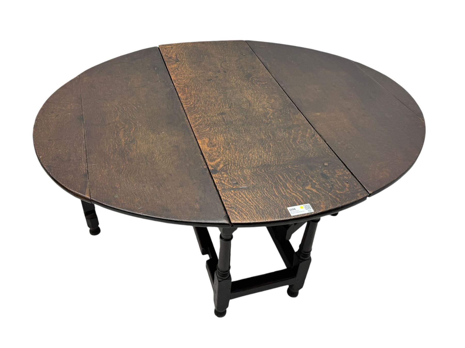 18th century oak dining table, oval drop-leaf top on gate-leg action base, turned supports united by stretchers 