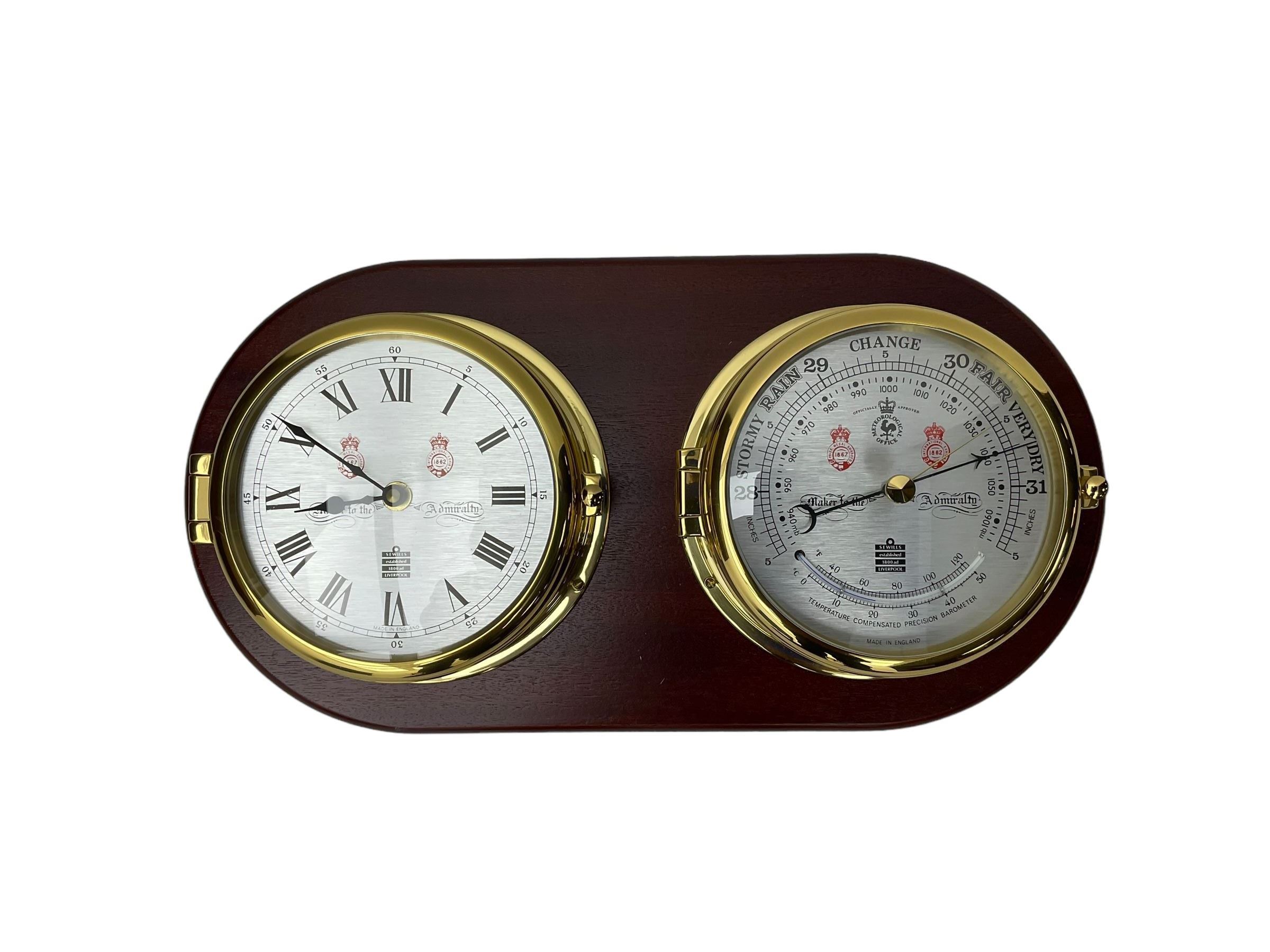 Sewell's - 20th century matching compendium aneroid barometer and quartz clock on a mahogany board,