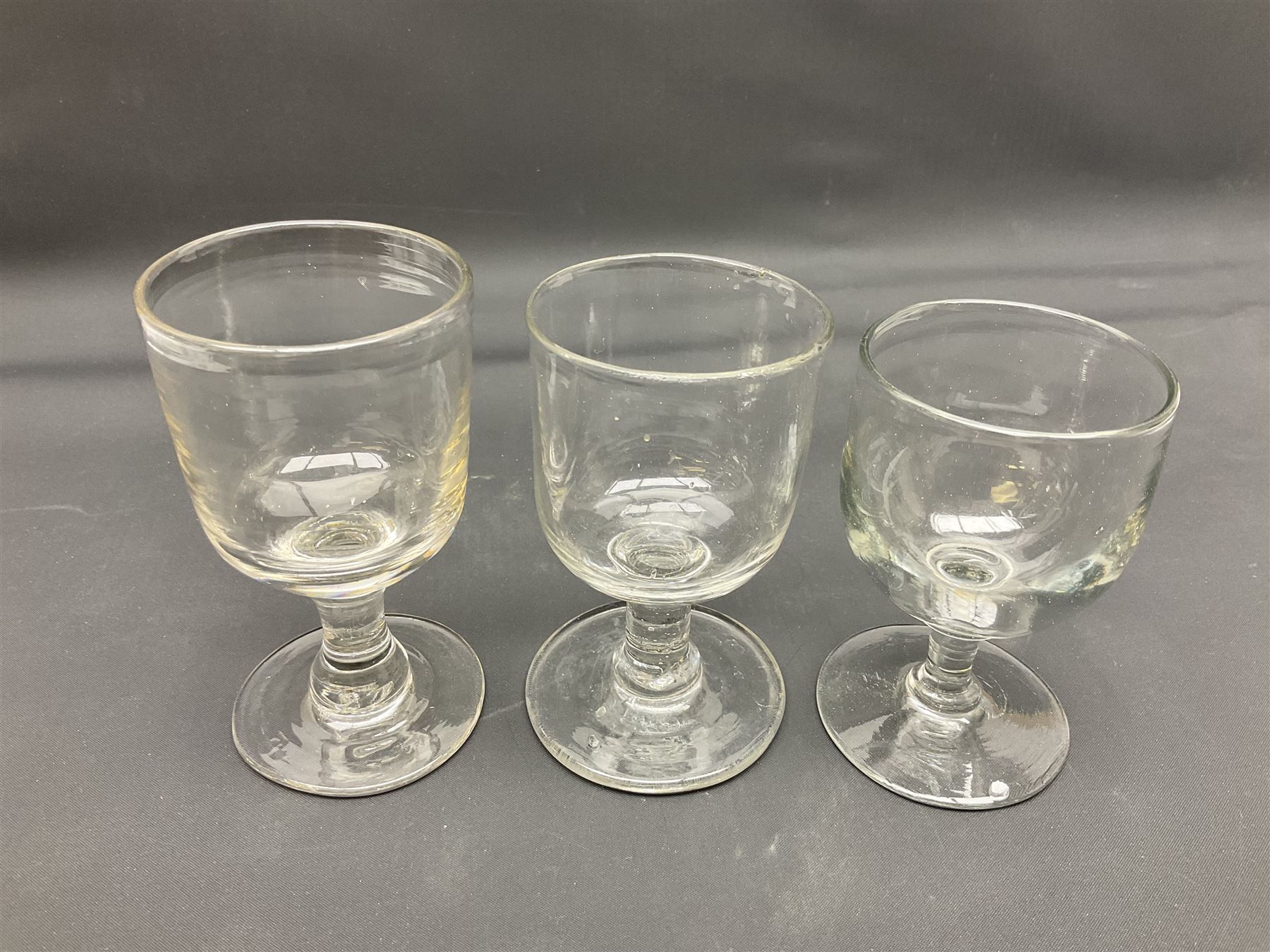 Collection of 18th century and later glassware, including set of three with twist stems and etched and fluted examples